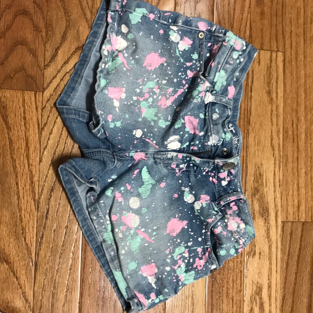 I’m selling Justice paint shorts.